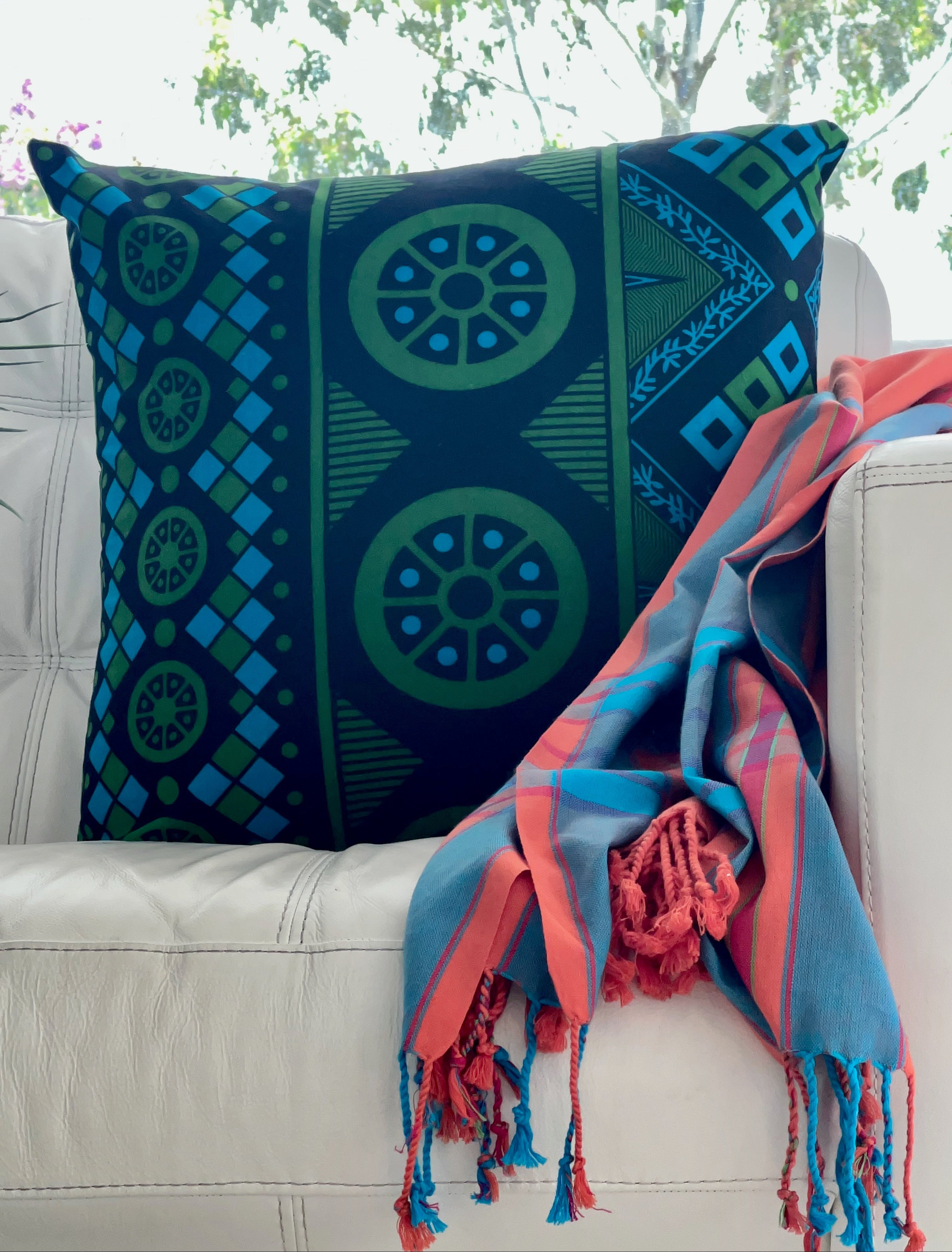 Green Turquoise & Black Cushion Cover with Orange Turquoise & Red Throw Rug