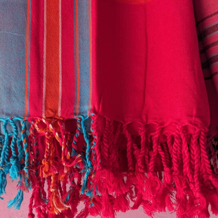 Red Turquoise & Orange Throw Rug Closeup