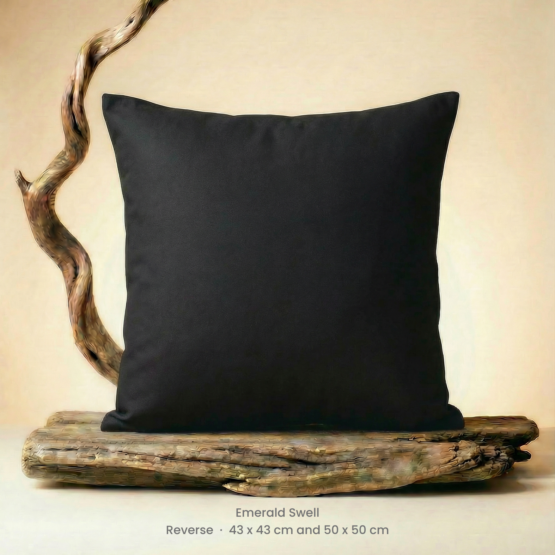 Black pillow on a wooden platform with a neutral background