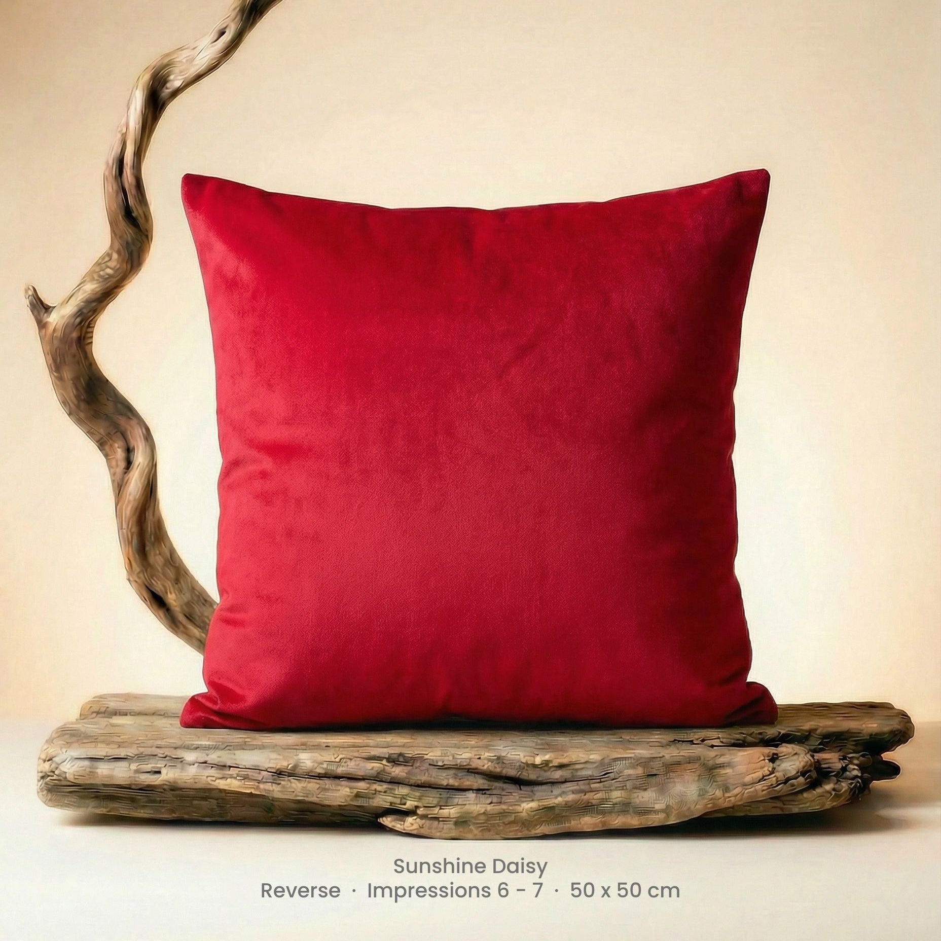 Red cushion on a driftwood with a neutral background
